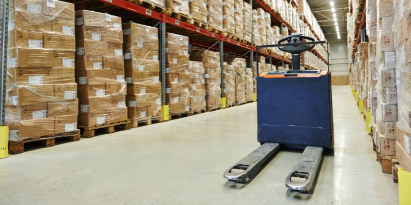 powered pallet trucks (2) A powered pallet truck used in a warehouse.