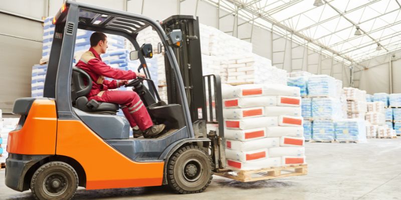 forklift-weight (2) The man is operating a forklift.